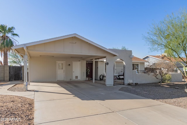 view of front of home with a carport