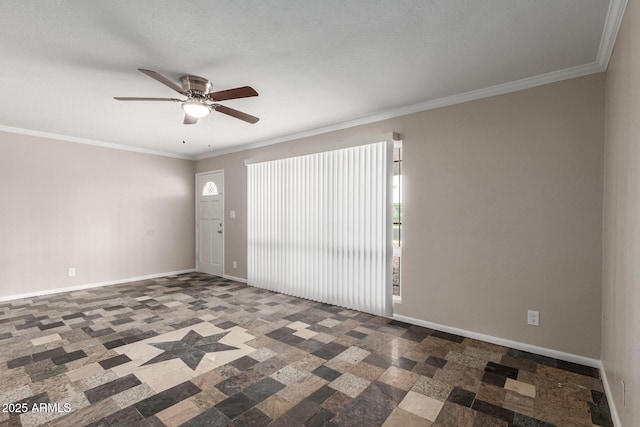 unfurnished room featuring a ceiling fan, baseboards, and ornamental molding