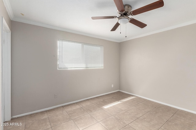 unfurnished room featuring light tile patterned floors, baseboards, ceiling fan, and crown molding