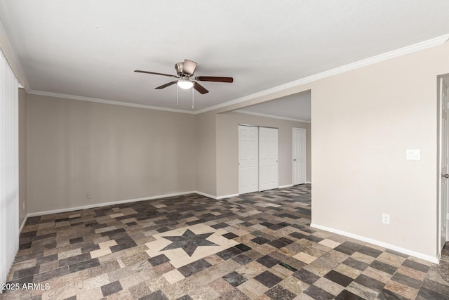 empty room featuring baseboards, ceiling fan, and ornamental molding