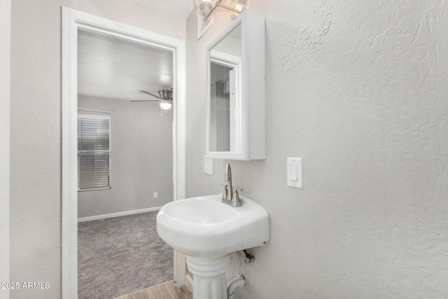 bathroom with ceiling fan