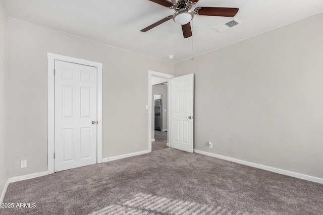 unfurnished bedroom with carpet and ceiling fan