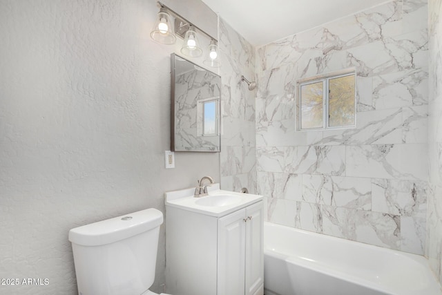 full bathroom featuring vanity, toilet, and tiled shower / bath combo