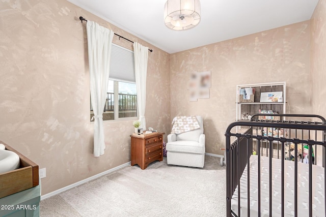 bedroom featuring wallpapered walls, baseboards, and carpet floors