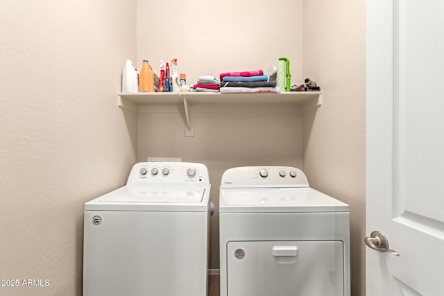 clothes washing area featuring laundry area and independent washer and dryer