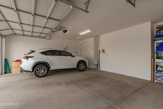 garage featuring a garage door opener