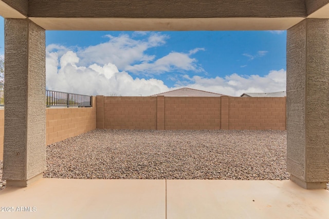 view of yard with a patio and a fenced backyard