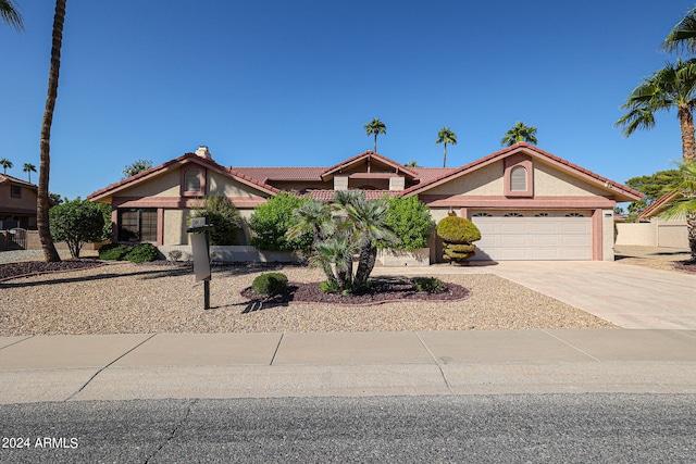 view of front of property featuring a garage