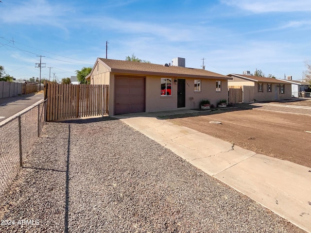 ranch-style house with a garage