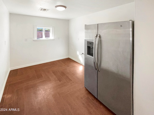 kitchen featuring stainless steel fridge