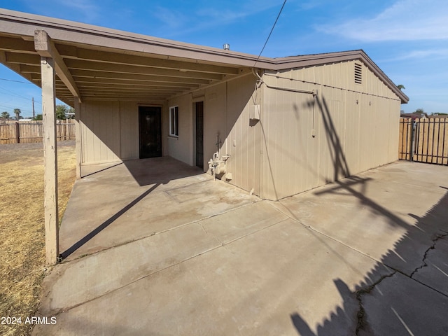 exterior space featuring a carport