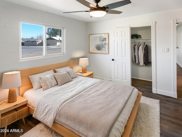 bedroom with a closet, ceiling fan, and dark wood-type flooring