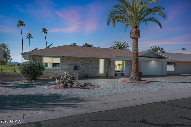 ranch-style house with a garage