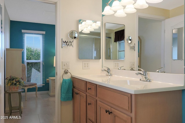 bathroom with tile patterned flooring and vanity