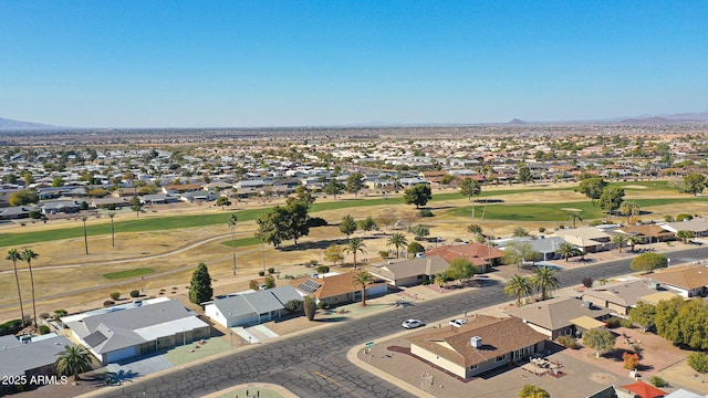 birds eye view of property featuring a mountain view