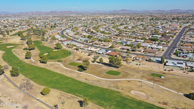 birds eye view of property featuring a mountain view