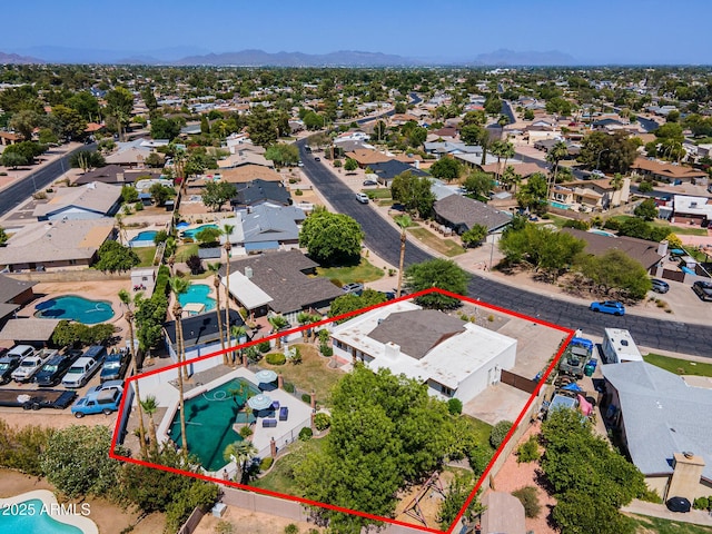 1452 E Gary St, Mesa, AZ 85203 - aerial view of residential area featuring property boundaries highlighted and a mountain backdrop