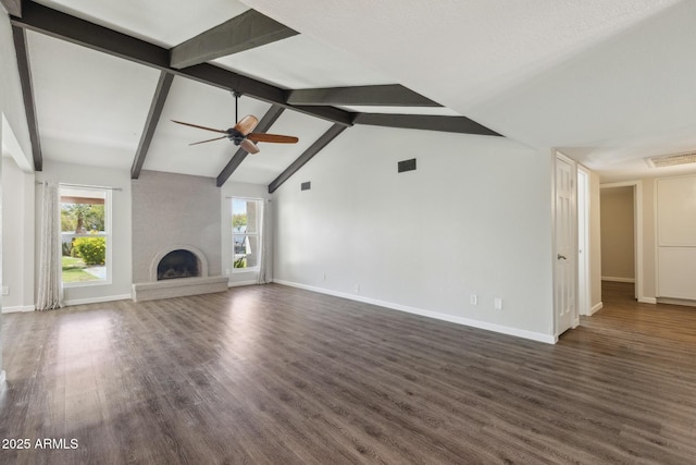 1452 E Gary St, Mesa, AZ 85203 - unfurnished living room with ceiling fan, dark wood-type flooring, and a fireplace