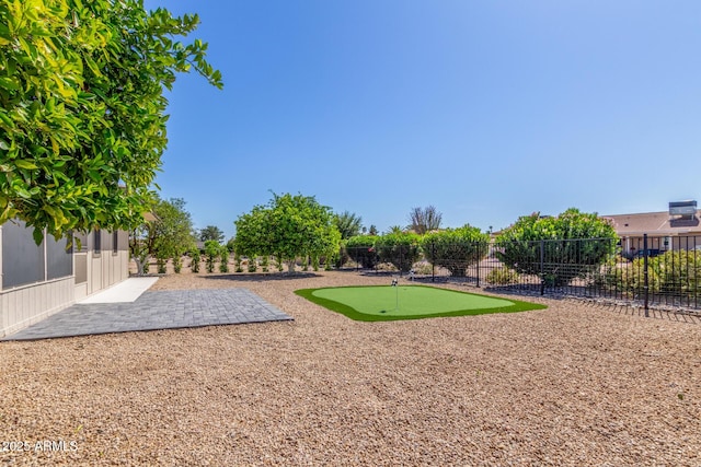 view of community featuring a patio and fence