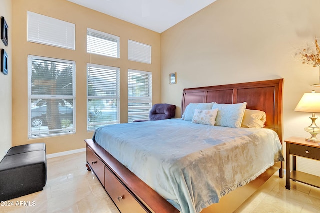 bedroom with light tile patterned floors