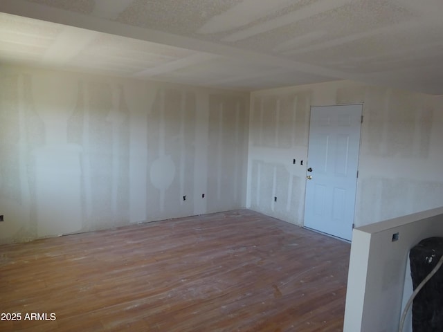 8838 N 8th St Unit 105, Phoenix, AZ 85020 - spare room with hardwood / wood-style floors