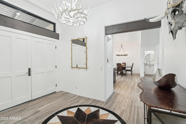 38953 N 57th Pl, Cave Creek, AZ 85331 - entrance foyer featuring a chandelier and light wood-style floors