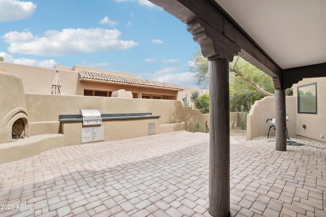 38953 N 57th Pl, Cave Creek, AZ 85331 - view of patio / terrace with an outdoor kitchen, fence, and grilling area