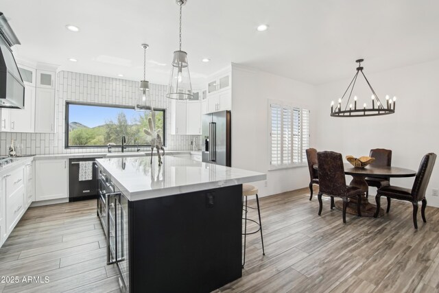 38953 N 57th Pl, Cave Creek, AZ 85331 - kitchen featuring high quality fridge, a chandelier, dishwasher, tasteful backsplash, and recessed lighting