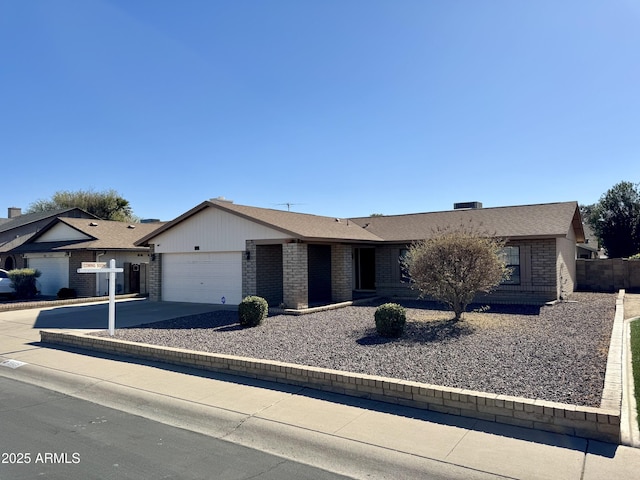 single story home with a garage