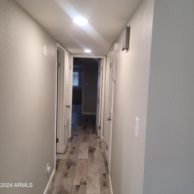 corridor featuring light hardwood / wood-style flooring