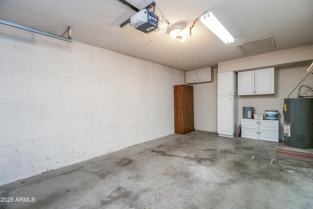 garage with electric water heater and a garage door opener