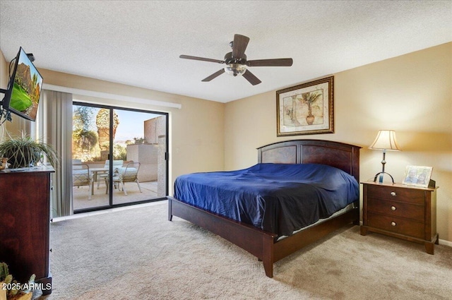 bedroom with ceiling fan, light colored carpet, a textured ceiling, and access to outside