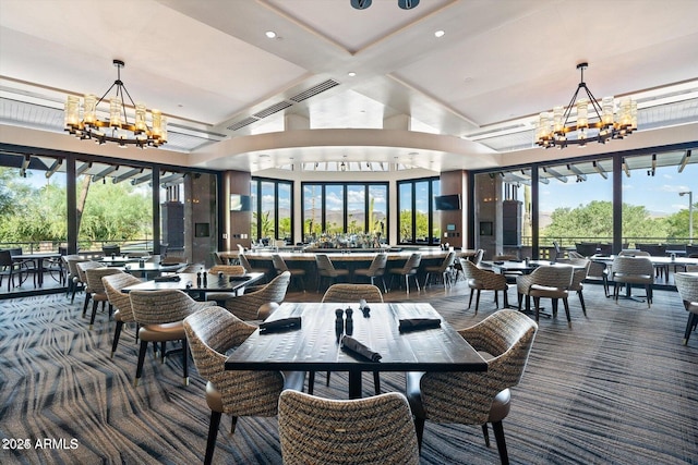 carpeted dining area featuring beamed ceiling, an inviting chandelier, and coffered ceiling