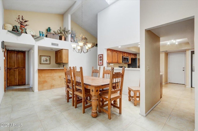 dining room with beamed ceiling, high vaulted ceiling, and a notable chandelier