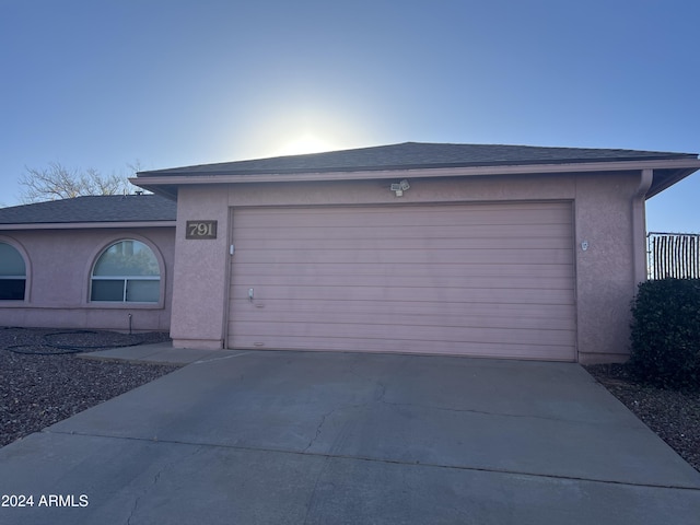 view of front of property featuring a garage