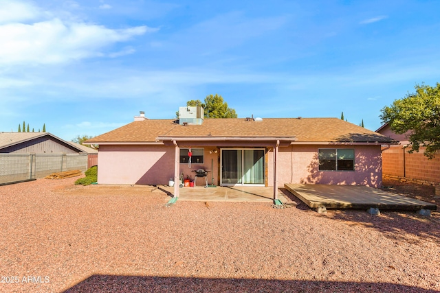 back of house featuring a patio