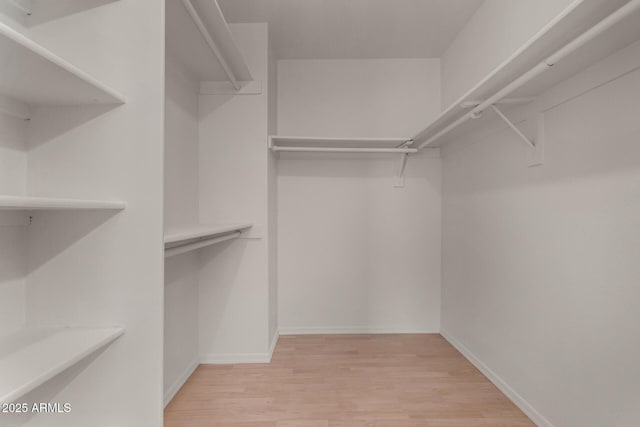 4644 W Havasupai Dr, Glendale, AZ 85308 - spacious closet featuring light wood-style flooring