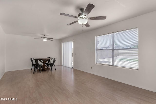 4644 W Havasupai Dr, Glendale, AZ 85308 - dining room featuring healthy amount of natural light, light wood-type flooring, and a ceiling fan