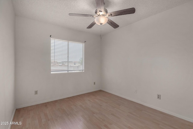 4644 W Havasupai Dr, Glendale, AZ 85308 - spare room with light wood-type flooring, ceiling fan, and a textured ceiling