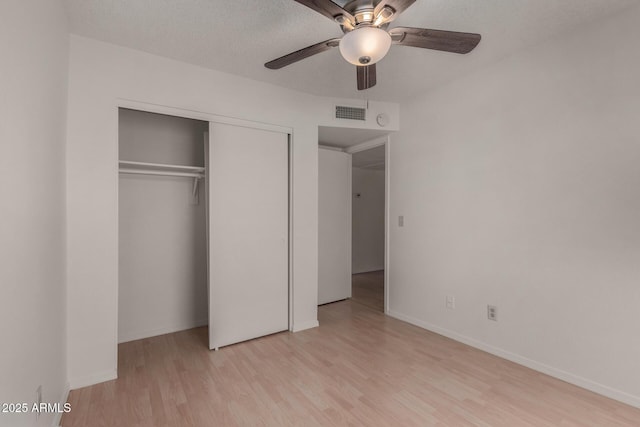 4644 W Havasupai Dr, Glendale, AZ 85308 - unfurnished bedroom featuring light wood finished floors, a closet, and ceiling fan