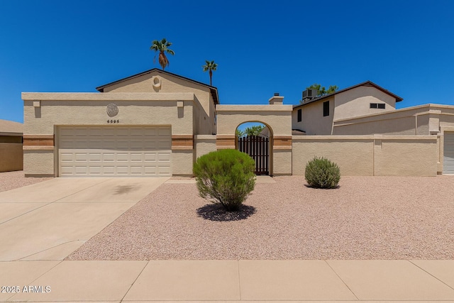 4644 W Havasupai Dr, Glendale, AZ 85308 - view of front of home with driveway, stucco siding, and a garage