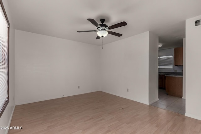 4644 W Havasupai Dr, Glendale, AZ 85308 - spare room featuring light wood-style floors and ceiling fan