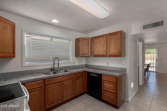 4644 W Havasupai Dr, Glendale, AZ 85308 - kitchen with dishwasher, brown cabinets, light tile patterned flooring, and range with electric stovetop