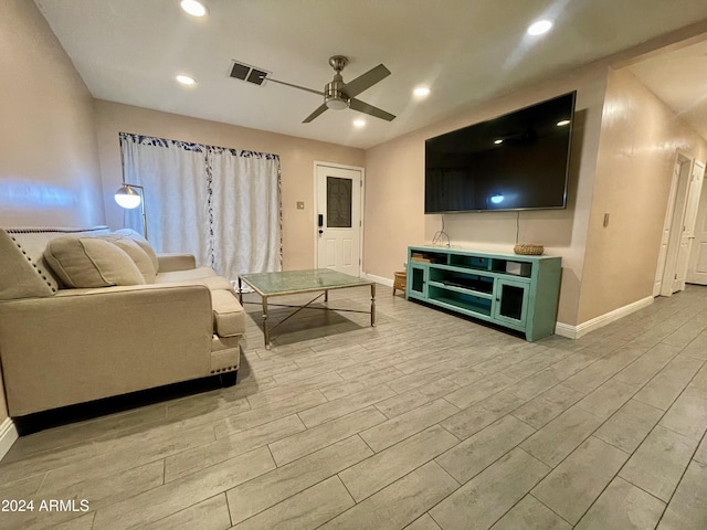 living room with ceiling fan