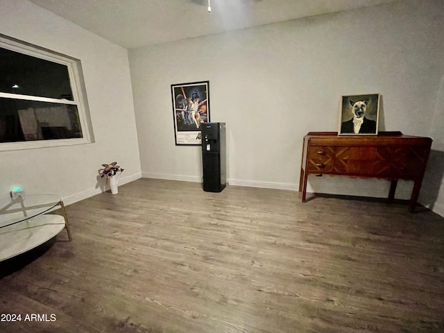 living area with hardwood / wood-style flooring