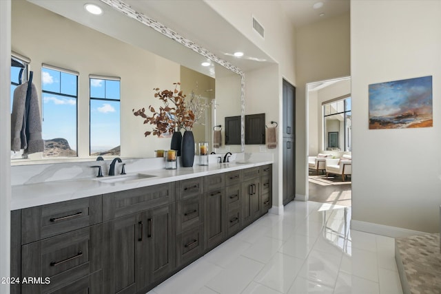 bathroom featuring tile patterned floors and vanity