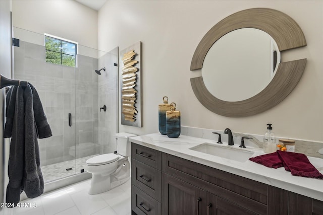 bathroom with vanity, an enclosed shower, tile patterned floors, and toilet