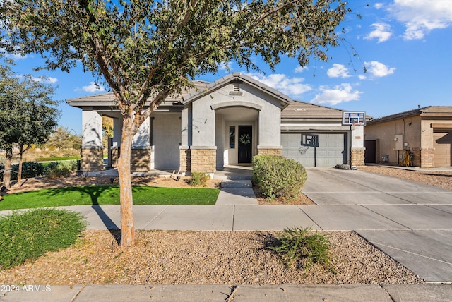 view of front of property with a garage