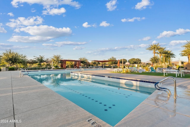 view of pool featuring a patio area