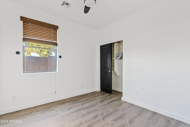 spare room with light wood-type flooring